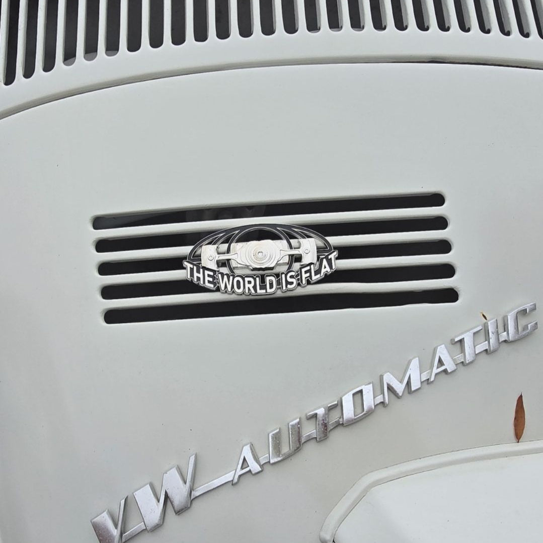 the world is flat enamel car grill badge on vw beetle