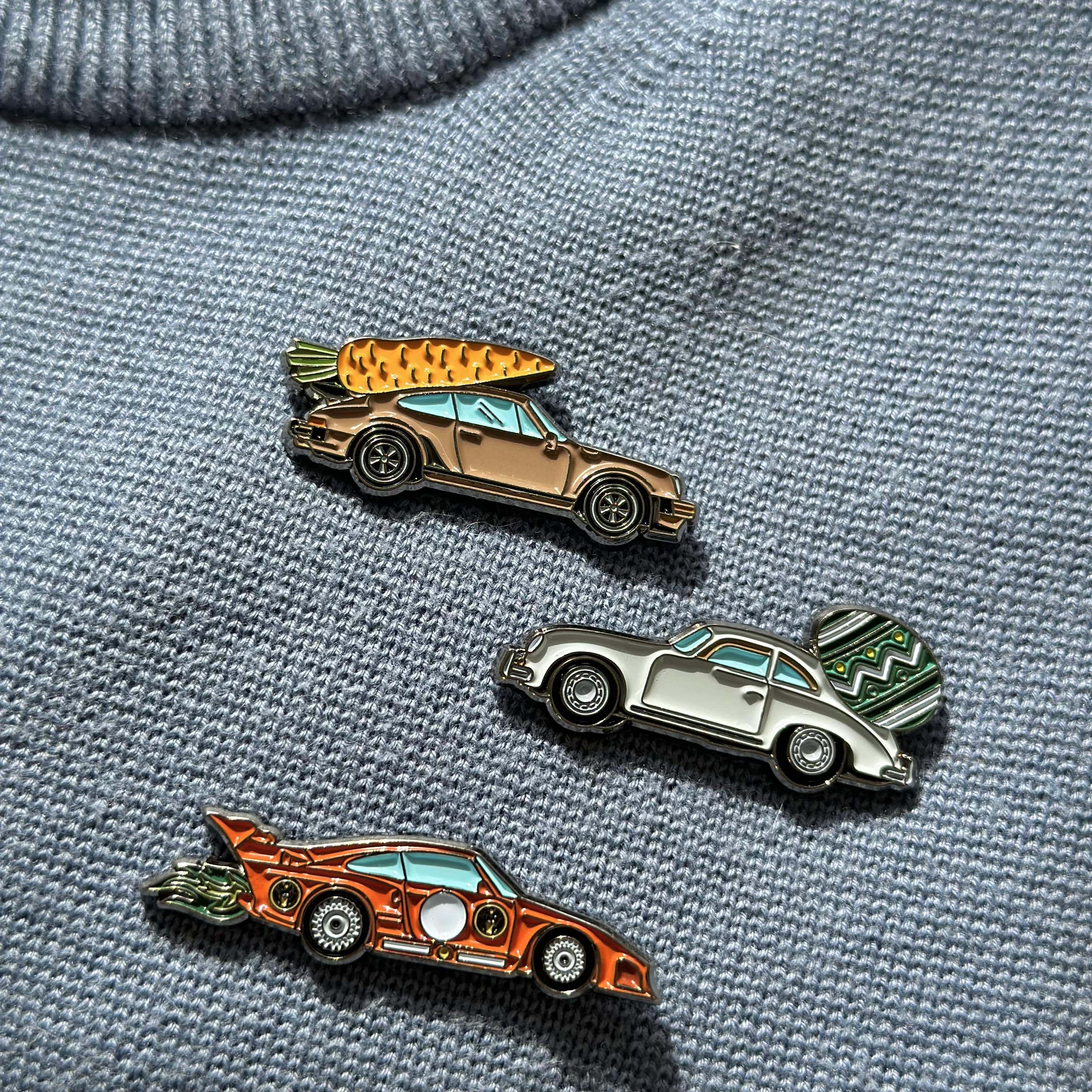 rennbetrieb porsche pins easter on blue pullover