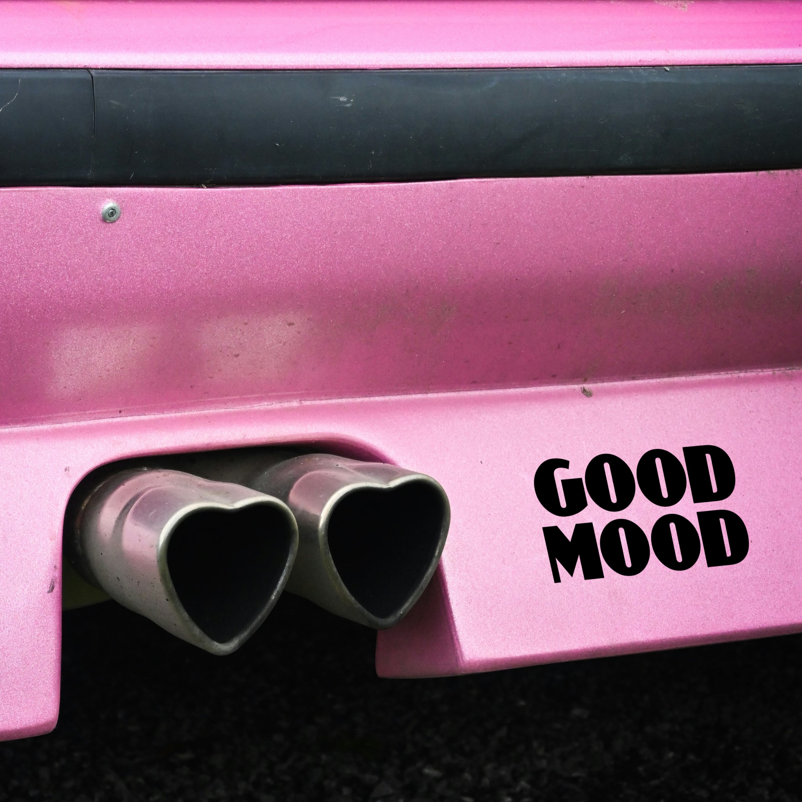 good mood sticker on pink bmw