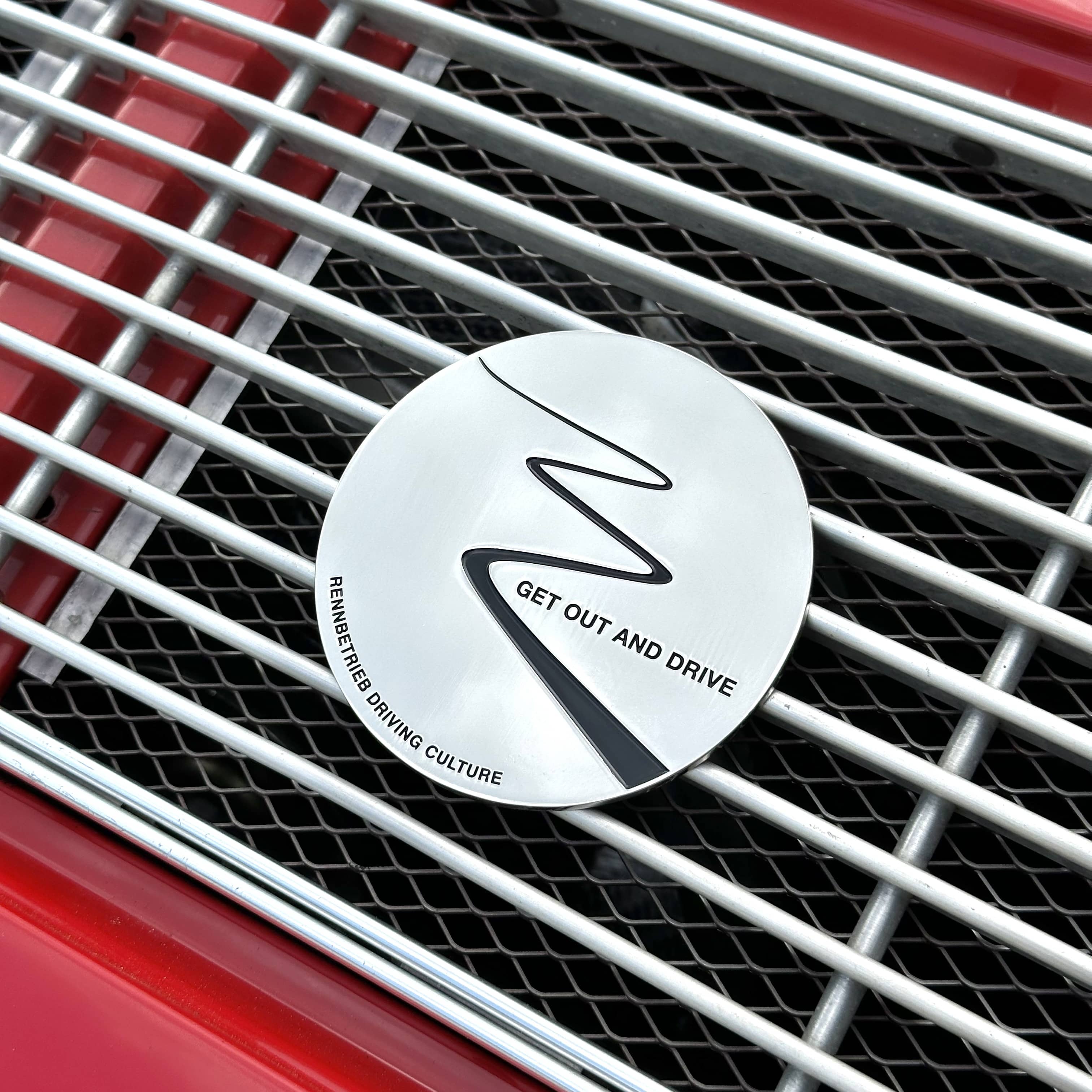 rennbetrieb enamel car grill badge get out and drive